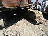 1995 JOHN DEERE 690E Photo #2