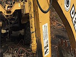 JOHN DEERE 310E Photo #2