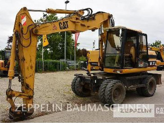 1999 CATERPILLAR M315 Photo