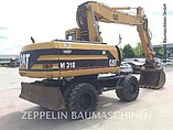 1999 CATERPILLAR M318 Photo #3