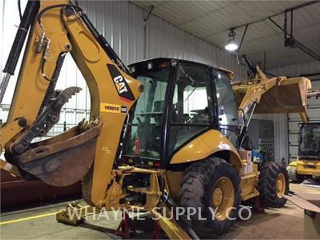 11 CATERPILLAR 420E ST