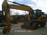 09 CATERPILLAR M318D