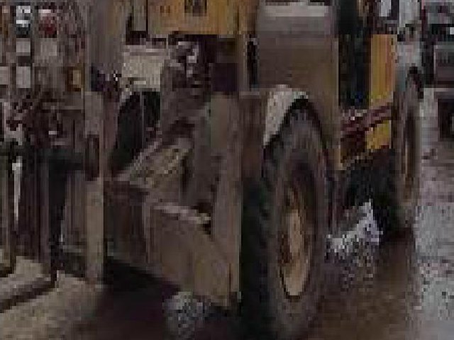 1999 CATERPILLAR TH103 Photo