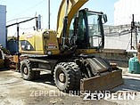 12 CATERPILLAR M318D