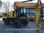 13 CATERPILLAR M318D