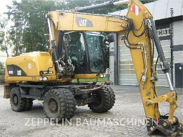 2010 CATERPILLAR M318D Photo