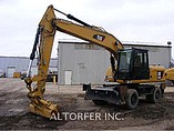 12 CATERPILLAR M318D