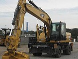 13 CATERPILLAR M318D
