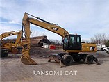 11 CATERPILLAR M322D