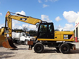 2010 CATERPILLAR M318D Photo #2