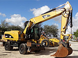 2010 CATERPILLAR M318D Photo #4